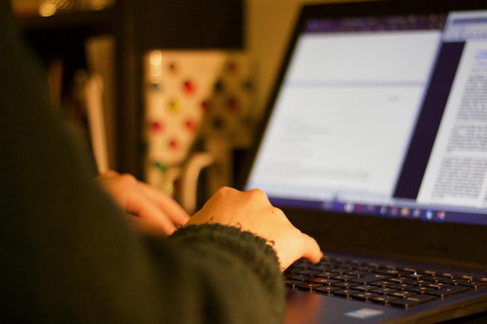 student-working-on-a-computer-QPWPVH4