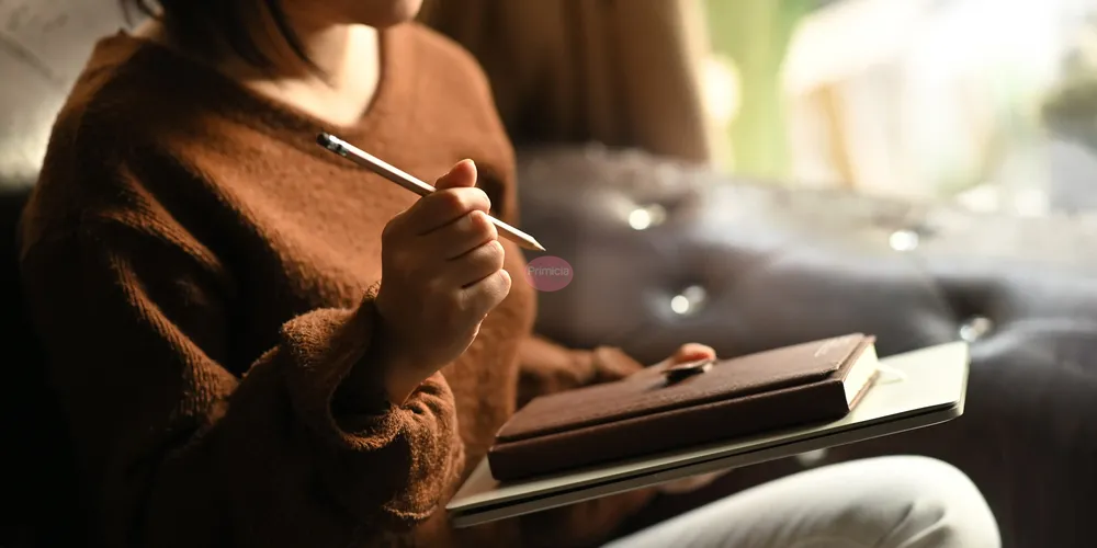 cropped-image-of-stylish-woman-holding-a-pencil-an-2023-11-27-05-01-41-utc